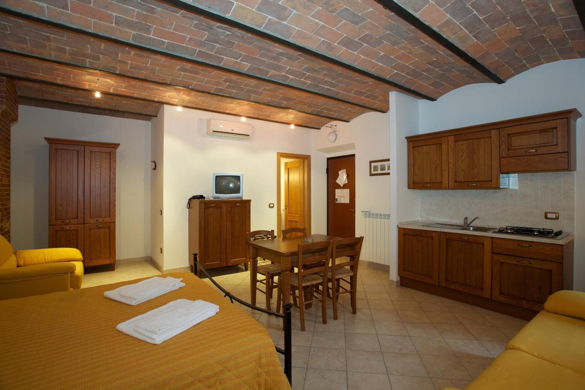 Aparthotel Oasi Del Grillo Castelnuovo Berardenga Habitación foto